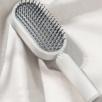 Relax & Clean Comb : Brosse à cheveux auto-nettoyante en un clic.